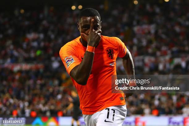 Quincy Promes of the Netherlands celebrates scoring his side's second goal during the UEFA Nations League Semi-Final match between the Netherlands...