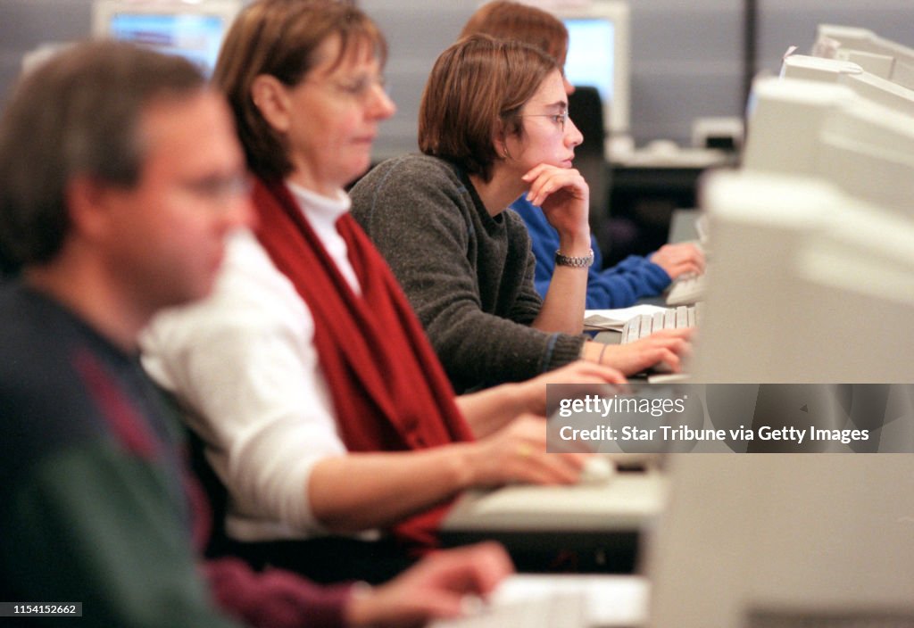 GENERAL INFORMATION: Minnetonka, MN - Scenes at the Hennepin County Library near Ridegedale shopping mall. The library opened October of 1999 and a little after a year past its opening, is extremely popular.
IN THIS PHOTO: The Learning Center at the Hen