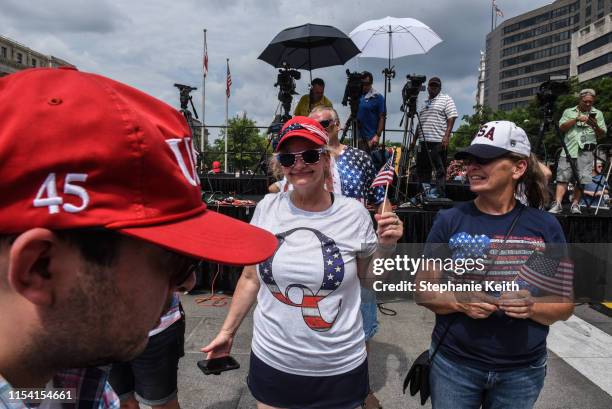 Woman wears a t-shirt in support of Qanon during a "Demand Free Speech" rally on Freedom Plaza on July 6, 2019 in Washington, DC. The demonstrators...