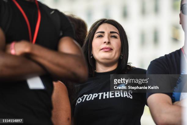 Laura Loomer waits backstage during a "Demand Free Speech" rally on Freedom Plaza on July 6, 2019 in Washington, DC. The demonstrators are calling...