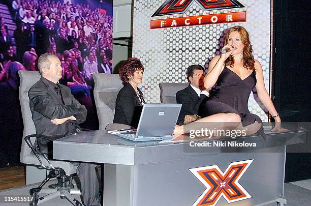 Waxwork models of Louis Walsh, Sharon Osbourne and Simon Cowell