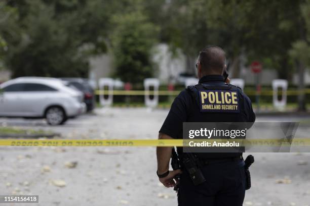 Policeman is seen at the site after an explosion at Florida shopping plaza, on July 06, 2019 in Plantation, Florida, United States. Several people...