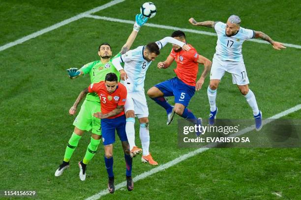 Chile's goalkeeper Gabriel Arias pulls off a save during the Copa America football tournament third-place match against Argentina at the Corinthians...