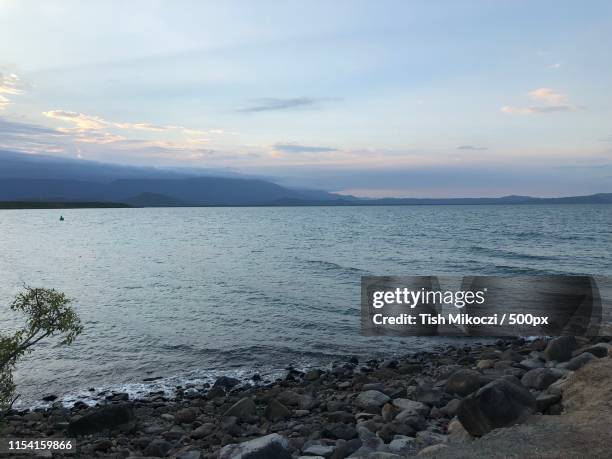 port douglas sunset - port douglas stock pictures, royalty-free photos & images