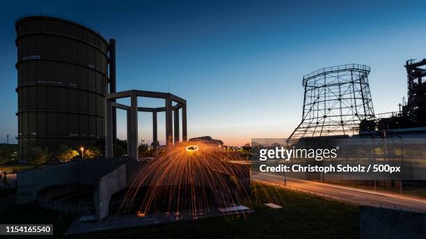 sunset and lightshow - dortmund stad stockfoto's en -beelden