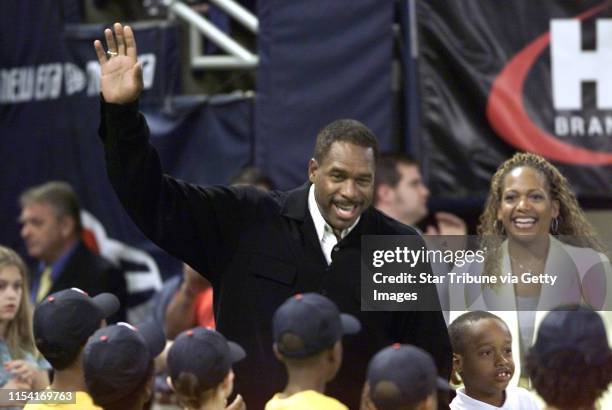 Dave Winfield waves to the crowd in the Metrodome as he makes his way through a gauntlet of St. Paul little leageurs during Dave Winfield night...