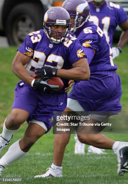 Eden Prairie, MN., Friday, 5/4/2001. Vikings runningback Michael Bennett received a hand-off from quarterback Billy Cockerham. The Vikings held their...