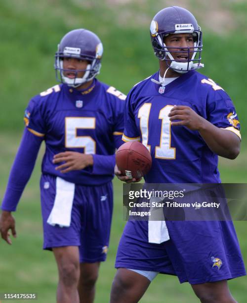 Eden Prairie, MN., Friday, 5/4/2001. Vikings quarterbacks Billy Cockerham and Daunte Culpepper lined up for passing drills at Winter Park. The...