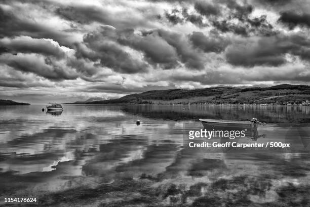 boats on the kyle of bute - geoff carpenter stock pictures, royalty-free photos & images