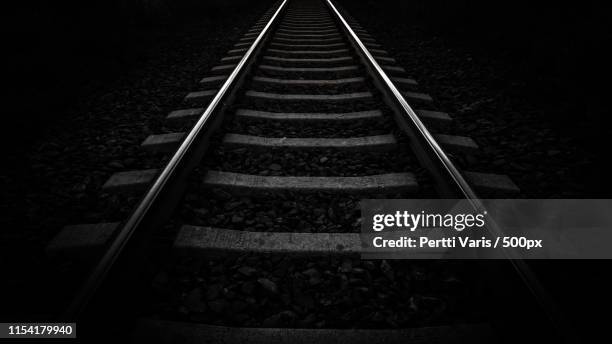 traintrack black and white - railroad track stock pictures, royalty-free photos & images