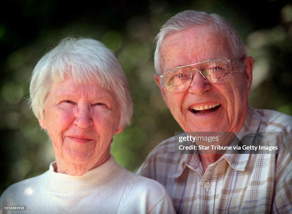 GENERAL INFORMATION: EXCELSIOR, MN; 6/19/2001:Lucian and Mary Brown were professional photographers in the 1950's.  Nineteen of their photos are included in a new book about family life in the era. 

IN THIS PHOTO: Lucian and Mary Brown on the porch of th