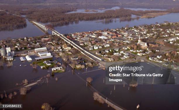 Aerial photography of flooding in the metro-east area and south along the Mississippi River valley, including Stillwater, Red Wing, Lake Pepin ,...