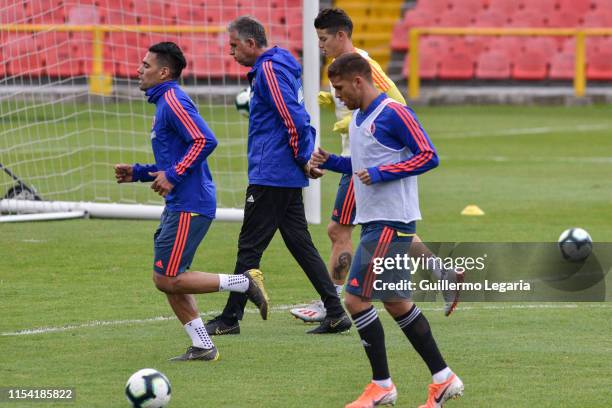 Radamel Falcao Garcia, team coach Carlos Queiroz, James Rodriguez and Gustavo Cuellar during a training session as part of the preparation for the...