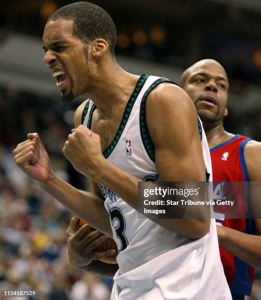 Minneapolis MN, 1/15/02 Timberwolves LA Clippers----Timberwolves Loren Woods reacts after he is fouled in the 4th peroid, in the the background of...