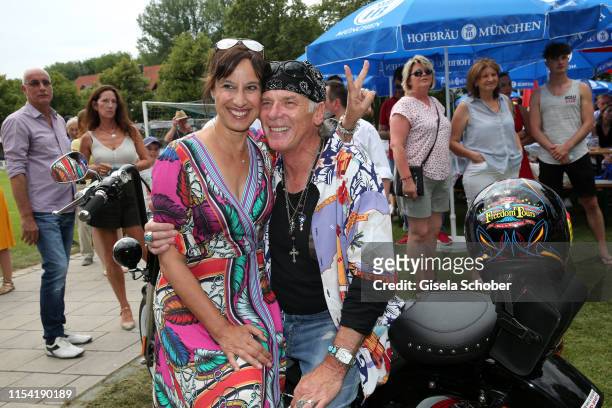 Wolfgang Fierek and his wife Djamila Mendil with his Harley Davidson during the Erich Greipl Tribute Tournament at Erich Greipl Stadion /FC Ismaning...