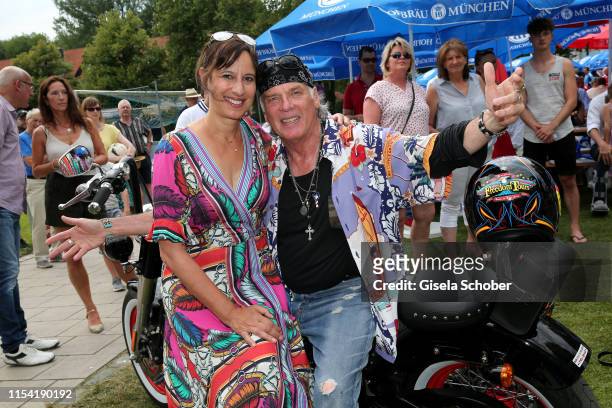 Wolfgang Fierek and his wife Djamila Mendil with his Harley Davidson during the Erich Greipl Tribute Tournament at Erich Greipl Stadion /FC Ismaning...