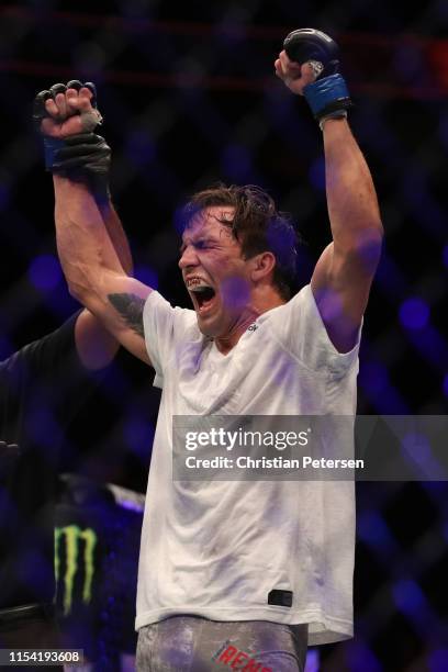 Chance Rencountre celebrates his win against Ismail Naurdiev of Austria in their welterweight fight during the UFC 239 event at T-Mobile Arena on...