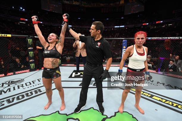Claudia Gadelha of Brazil celebrates her win over Randa Markos of Canada in their strawweight fight during the UFC 239 event at T-Mobile Arena on...