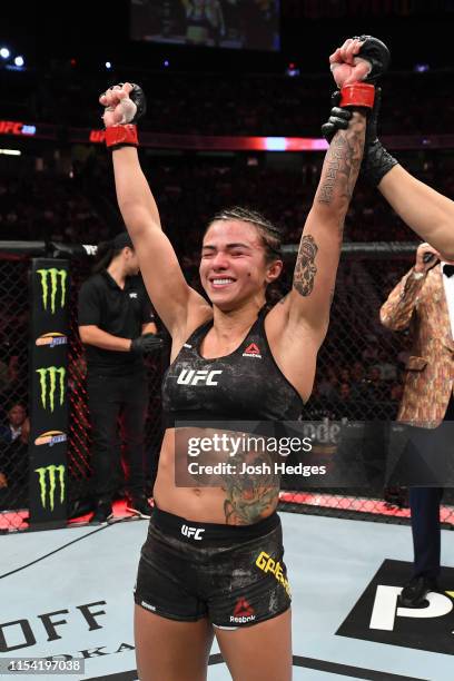 Claudia Gadelha of Brazil celebrates her win over Randa Markos of Canada in their strawweight fight during the UFC 239 event at T-Mobile Arena on...