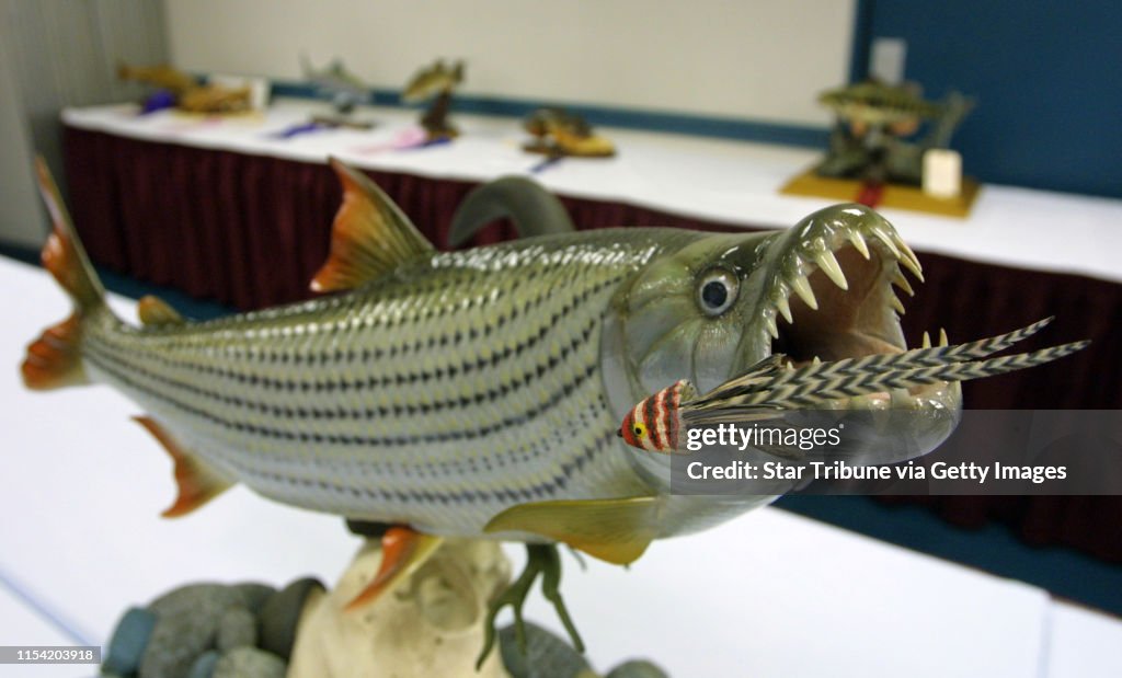 GENERAL INFORMATION: Bloomington, Mn., Sun., July 21, 2002--The 2002 northern Nationals carving competition featuring song bird, shorebirds, raptors, fish and mammals.
IN THIS PHOTO: Jeff Compton of Nisswa, Mn., won best of show in decorative fish with t