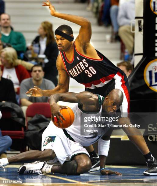 Minneapolis - Target Center - Timberwolves vs. Portland basketball IN THIS PHOTO: The Wolves Kevin Garnett slips as he attempts to drive around...