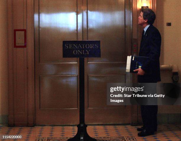 On route from a session in the Senate chambers where he gave a speech extolling the bravery of the troops fighting in Iraq, Senator Norm Coleman...