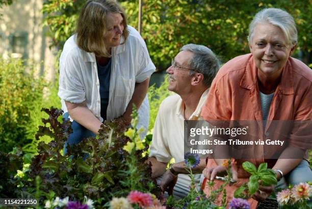 Minneapolis, MN 7/17/2002--Kathy Koutsky and husband Dean, work in their backyard raised beds, vegetable gardens. The Koutsky's live on James Ave....