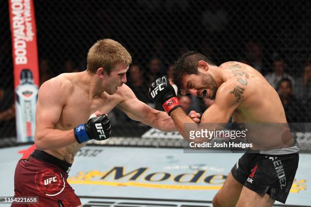 Arnold Allen of England lands a punch on Gilbert Melendez in their featherweight fight during the UFC 239 event at T-Mobile Arena on July 6, 2019 in...