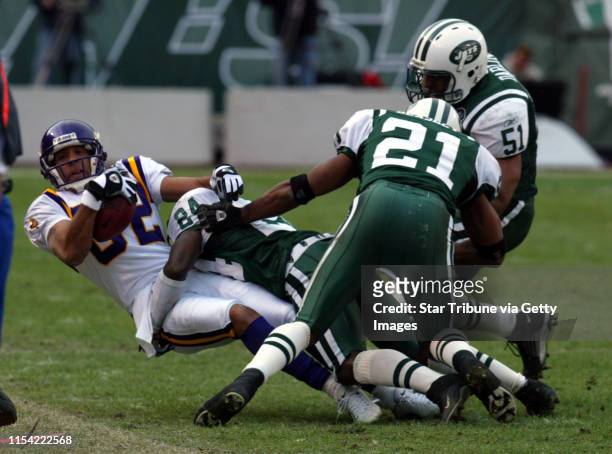 Secaucus, NJ - Minnesota Vikings vs New York Jets ta the Meadowlands. Viking wide receiver Derrick Alexander is brought down after a reception by the...