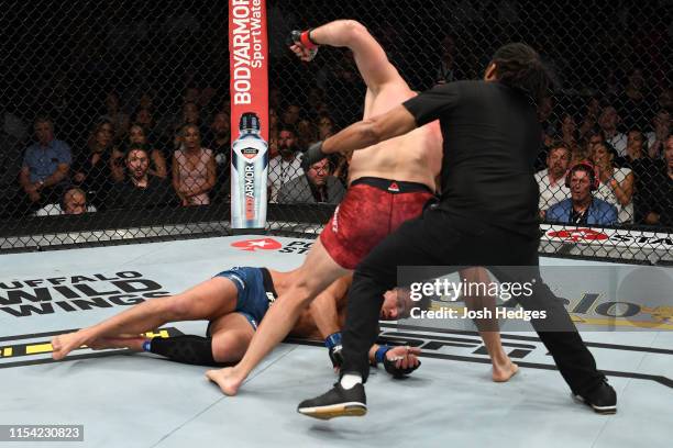 Jan Blachowicz of Poland finishes Luke Rockhold in their light heavyweight fight during the UFC 239 event at T-Mobile Arena on July 6, 2019 in Las...