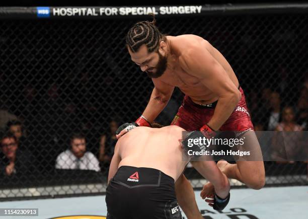 Jorge Masvidal knees Ben Askren in their welterweight fight during the UFC 239 event at T-Mobile Arena on July 6, 2019 in Las Vegas, Nevada.