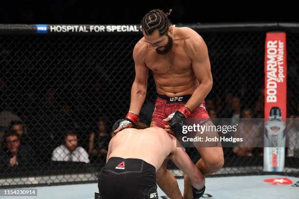 Jorge Masvidal knees Ben Askren in their welterweight fight during the UFC 239 event at T-Mobile Arena on July 6, 2019 in Las Vegas, Nevada.