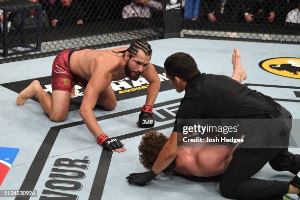 Jorge Masvidal talks to Ben Askren in their welterweight fight during the UFC 239 event at T-Mobile Arena on July 6, 2019 in Las Vegas, Nevada.