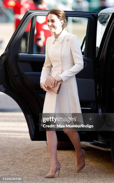 Catherine, Duchess of Cambridge, steps out of her Range Rover car as she attends the Household Division's 'Beating Retreat' at Horse Guards Parade on...