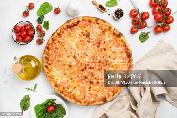 tasty cheese pizza on white background top view - cheese pizza stock-fotos und bilder