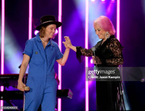 Brandi Carlile and Tanya Tucker perform on stage during day 1 of 2019 CMA Music Festival on June 6, 2019 in Nashville, Tennessee.