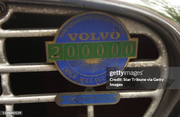 03_minneapolis - - - - The official Volvo 2 million mile plate on the fgront of Irv Gordon's Volvo.