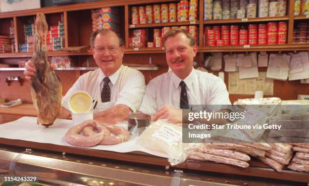 Warren Dahl, left, owner of the meat market at Ingebretsen's....and his son Steven, with some of the specialties for this time of the year. Warren is...