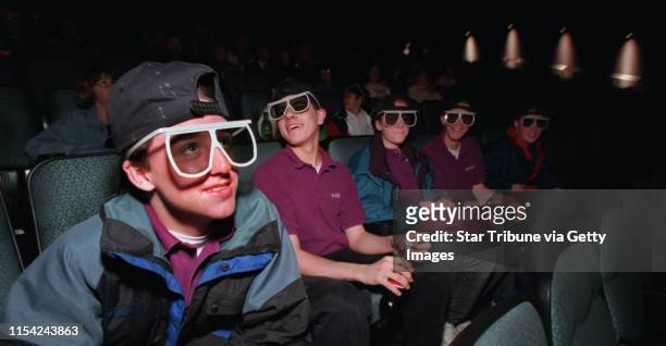 Patrick Kjeldahl, Steve Schultz, Beth Cordes, Mike Cordes and Nich Youngberg tried on their 3D glasses at the beginning of "Into The Deep" at the...