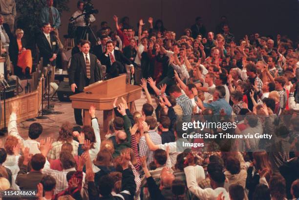 Pentecostal revival at the Brownsville Assembly of God. Evagelist Steve Hill and Pastor John Kilpatrick in front of worshippers at the Brownsville...