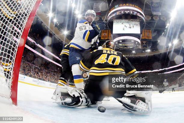 Tuukka Rask of the Boston Bruins allows a second period goal to Ryan O'Reilly , #90 of the St. Louis Blues in Game Five of the 2019 NHL Stanley Cup...