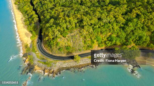 aerial drone photo of coastal and nature scene and coastal highway - cairns road stock pictures, royalty-free photos & images