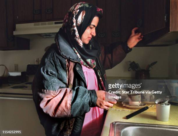 Gean Abdulrahman, wife of Jamal Amin makes Tea for the first time in her new home in an Apartment complex in west Fargo.