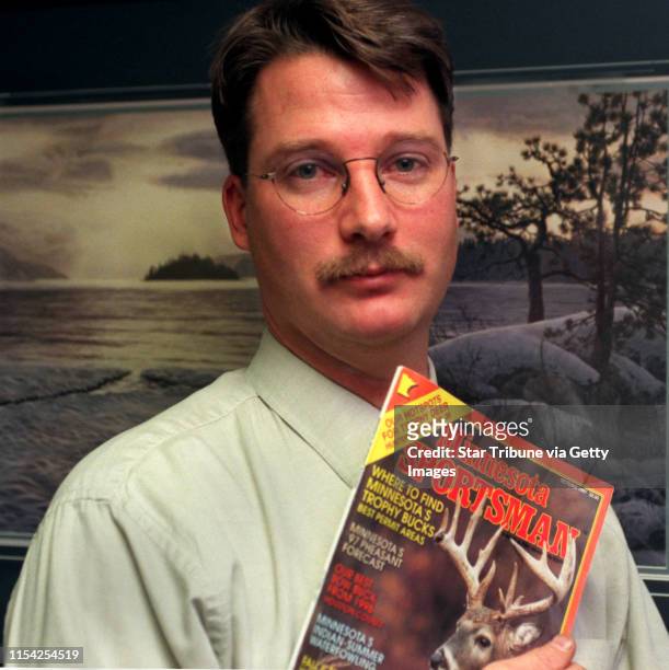 Brian Maupin, deer hunter. -- Brian Maupin holds the latest issue of Minnesota Sportsman which sites Ely as having the most bucks per mile.