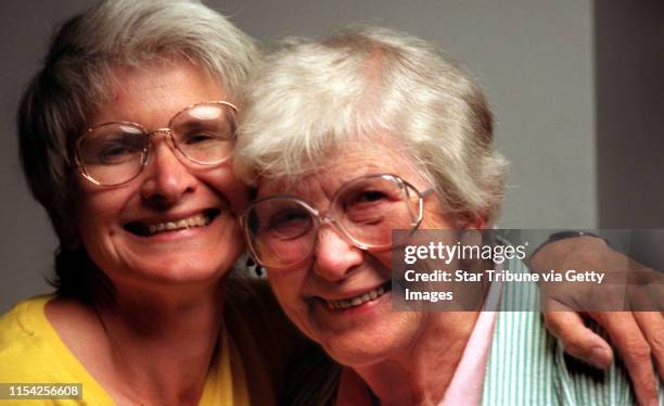Genevieve Gross and daughter Karen Gross -- Karen Gross, left, gives her 85-year-old mother Genevieve Gross a congratulatory hug at Minneapolis...