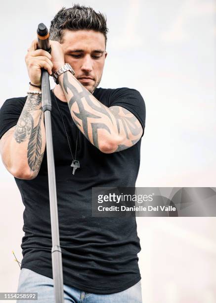 Michael Ray performs on stage during day 1 of 2019 CMA Music Festival on June 06, 2019 in Nashville, Tennessee.