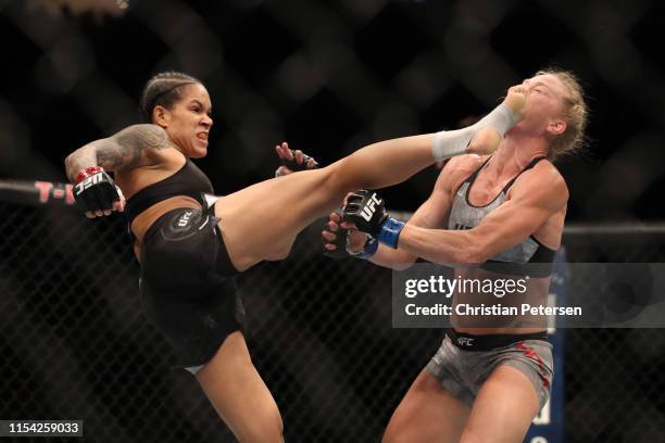 Amanda Nunes of Brazil kicks Holly Holm in their UFC bantamweight championship fight during the UFC 239 event at T-Mobile Arena on July 6, 2019 in...