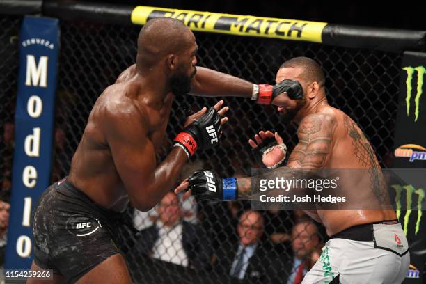 Jon Jones punches Thiago Silva of Brazil in their UFC light heavyweight championship fight during the UFC 239 event at T-Mobile Arena on July 6, 2019...