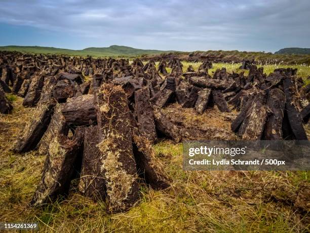 cut peat in county donegal - ireland - peat stock pictures, royalty-free photos & images