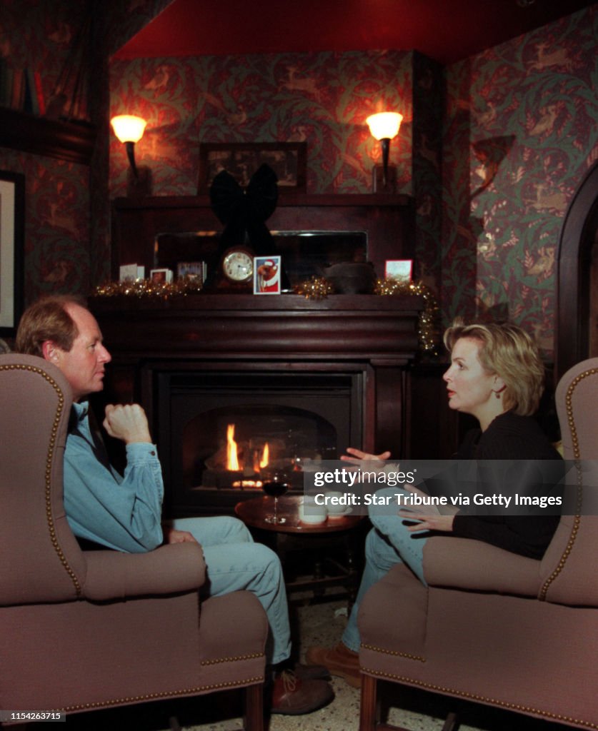 The Local, a new bar/restaurant downtown -- John Erickson and Diane Hyland sit by a fireplace at one end of the bar.